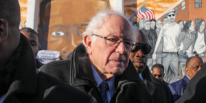  Presidential candidate Bernie Sanders stands in front of a mural paying tribute to Freddie Gray in Sandtown.Photography by Meredith Herzing