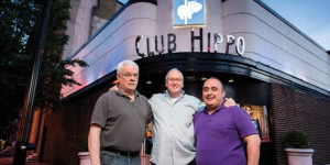  From left: Gilbert Morrisette, Charles L. “Chuck” Bowers, and Paul Liller outside The Hippo.Photography by Mike Morgan