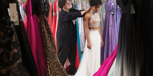  Karen Mazer helps a client at her shop, Synchronicity Boutique in Pikesville.Photography by David Colwell