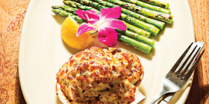  Crab imperial with asparagus and an orchid garnishPhoto by Scott Suchman