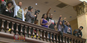  Activists at City Hall protesting City Council's approval of new police commissioner Kevin Davis.baltimore.cbslocal.com