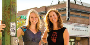   The Stoop co-founders Jessica Henkin, left, and Laura Wexler outside the Creative Alliance.Photography by Sean Scheidt