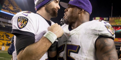  Joe Flacco and Terrell Suggs celebrate in Heinz Field after the Ravens beat the Steelers in the AFC wild-card game.Courtesy of the Baltimore Ravens